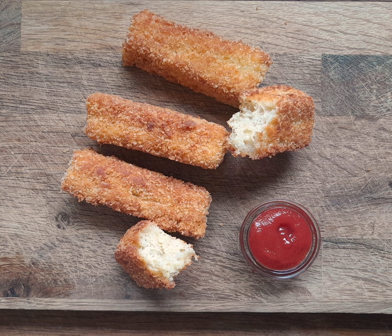 Four fingers of Crunchy Eggy Bread with tomato ketchup for dipping